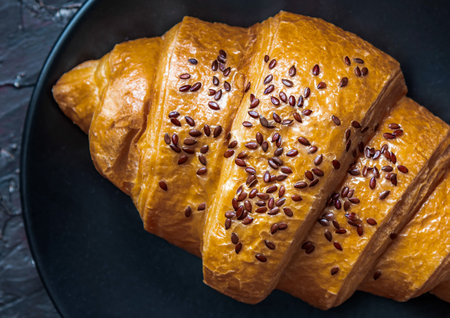 Macro photo of the texture of a delicious fresh baked croissant,