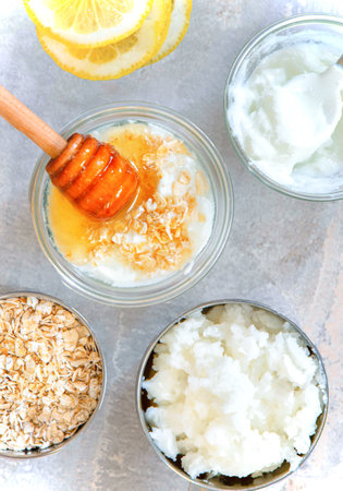 Natural Ingredients for Homemade Body Face Scrub Oat Oil. Beauty Concept.の写真素材
