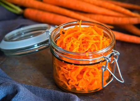 Healthy organic carrot salad in jar. Diet food conceptの写真素材