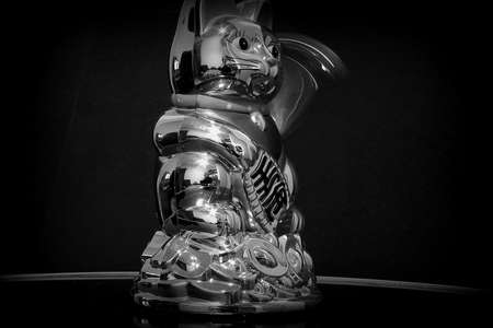 A traditional chinese lucky cat on the moveの写真素材