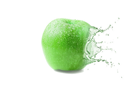 Wet juicy green appleの写真素材