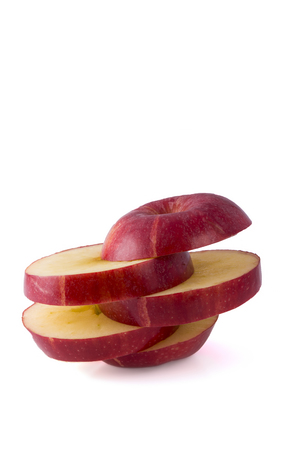 Juicy red apple slicedの写真素材