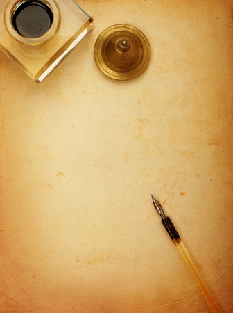 Fountain pen and inkwell and old paperの写真素材