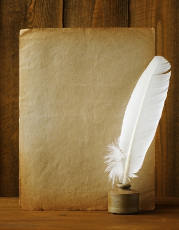 White pen in the ink and old paperの写真素材