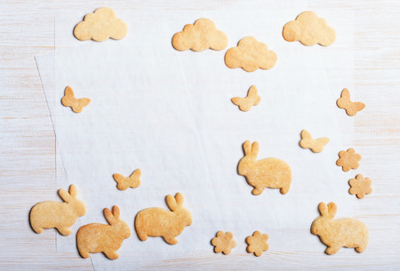 Easter cookies in the shape rabbits, butterflies and cloudsの写真素材