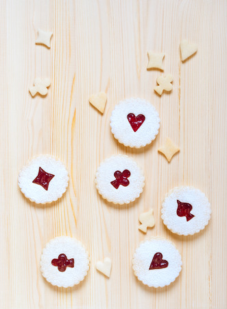 Linzer cookies with cherry jam on the wooden tableの写真素材