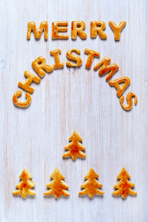 Inscription from the letters of cookies on the wooden tableの写真素材
