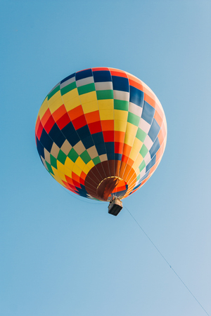 A colorful hot air balloon in Three Natural Bridges, Wulong ancient natural bridge Scenic Area, Wulong National Park, famous valley in Chongqing China,の写真素材