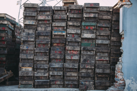 Beijing , China - Dec 21, 2014: colorful crates massive stacked on wooden pallets in a market. the...