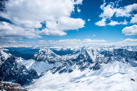 panoramic view on top of the zugspitze mountainの写真素材
