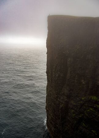 huge cliffs of the faroer islandsの写真素材