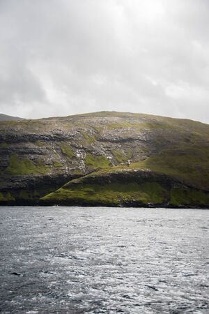 ocean on the shores of a fjordの写真素材