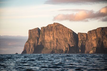 green cliffs falling to the oceanの写真素材