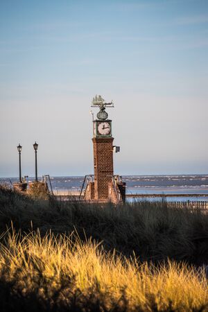 clock tower on the beachの写真素材