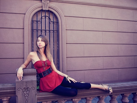A portrait of a stylish young lady in a charming enviromentの写真素材