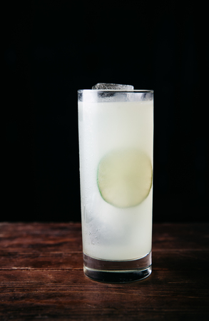 Summer refreshing alcoholic drink on rustic backgroundの写真素材