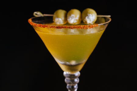 Dirty Martini Cocktail on dark backgroundの写真素材