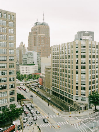 A view of a vibrant city main street showcasing a blend of modern and historic buildings during...