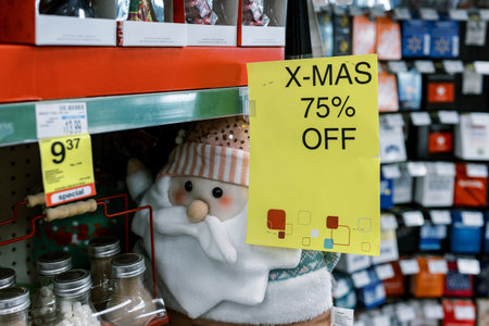 A colorful store aisle with a festive sale sign and a cheerful snowman attracts holiday shoppers.