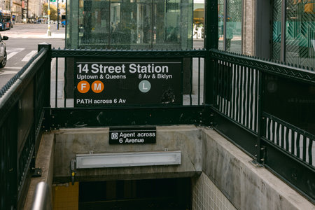 Entrance to 14 Street Station in New York City includes subway service and neighborhood informationの写真素材
