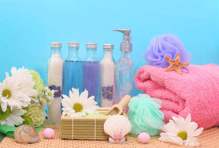 Bath and Spa Products With Sea Shells on Blue Backgroundの写真素材