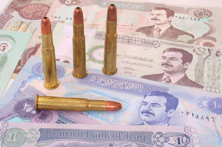 Paper Currency From Iraq With Four Bulletsの写真素材