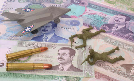 Currency From Iraq with Bullets and Plastic Soldiersの写真素材