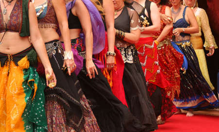 Row of Belly Dancers Preforming at a Festivalの写真素材