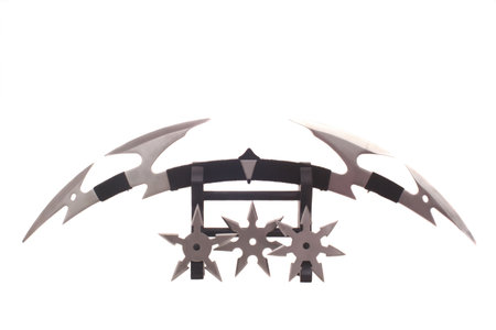 Knife With Trhrowing Stars on White Backgroundの写真素材