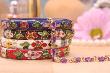 Oriental Style Vintage Bracelets and Gold and Amethyst Bracelet on Vanityの写真素材