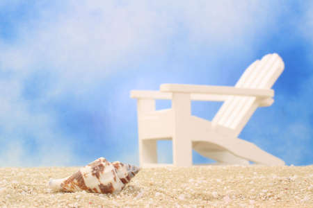 Sea Shell and Beach Chair, Shallow DOF, Focus on Shellの写真素材