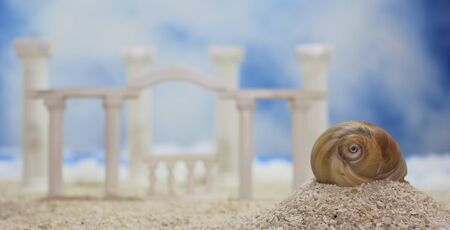 Seashell on Tropical Beach With Roman Style Ruins