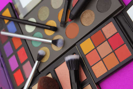 Colorful Cosmetic Pigment Palettes and Various Cosmeticsの写真素材