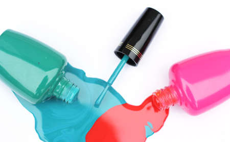Spilled Nail Polish on White Background Pink and Green