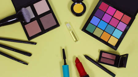 Cosmetics on yellow paper backgroundの写真素材