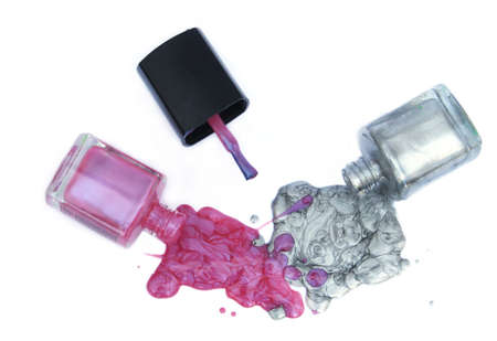 Pink and Silver Nail Polish on White Backgroundの写真素材