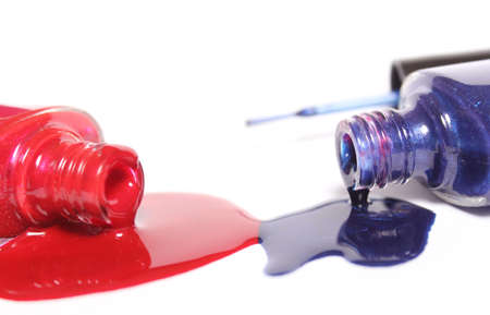 Red, White and Blue Nail Polish Spilled on Whiteの写真素材
