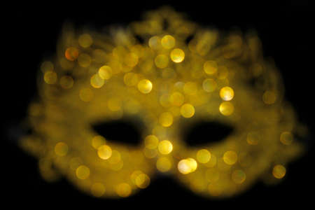 Defocused Gold Glitter Carnival Mask Bokehの写真素材