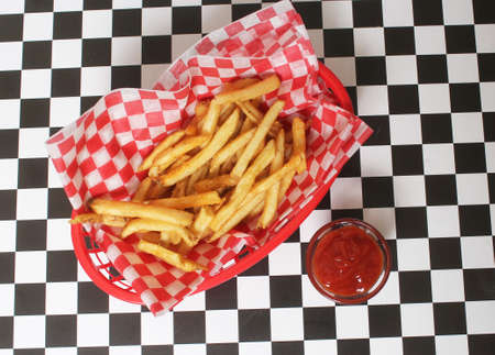 French Fried Potatoes in Retro Cafe on Table