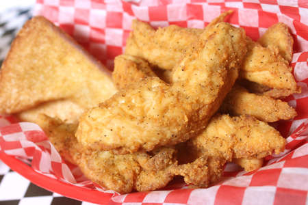 Chicken Tenders With Toast in Retro Diner on Table
