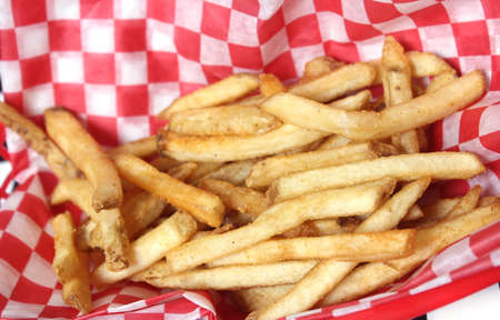 French Fried Potatoes in Retro Cafe on Table