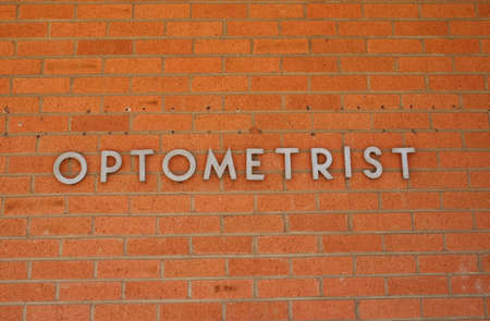 Optometrist Sign Optometrist Sign on Brick Wall