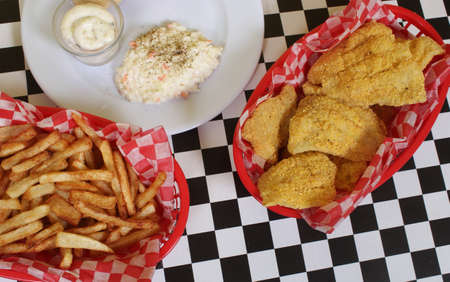 Fried Catfish With Coleslaw and French Friesの写真素材
