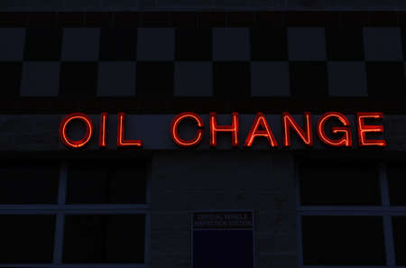 Neon Oil Change Sign at Service Departmentの写真素材