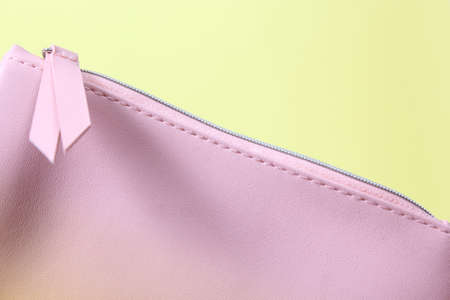 Bright Summer Cosmetic Bag With Yellow Backgroundの写真素材