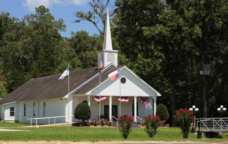 Small White church With Flags in Rural Texasの写真素材