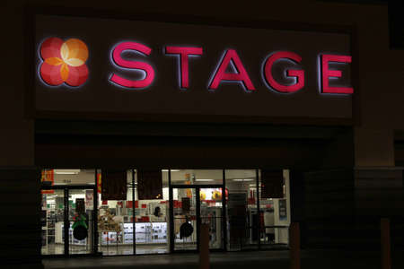 Tyler, TX - November 30, 2019: Stage Store at night with Store Closing Sign located on SE Loop 323...
