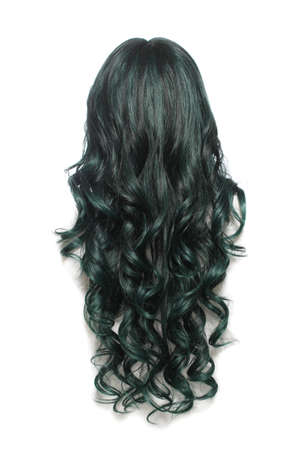 Black and Green Wig on Mannequin head with white backgroundの写真素材