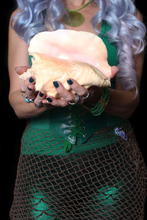 Woman Dressed as Mermaid With Sea Shell, Shallow DOF