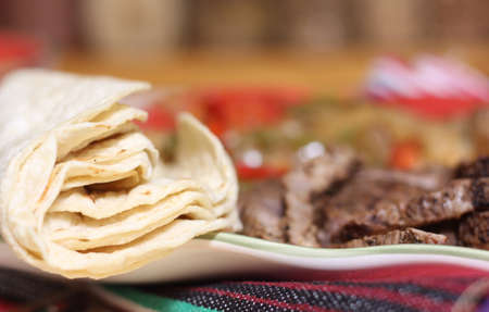 Fresh Tortillas on Plate With Fajita Dinner